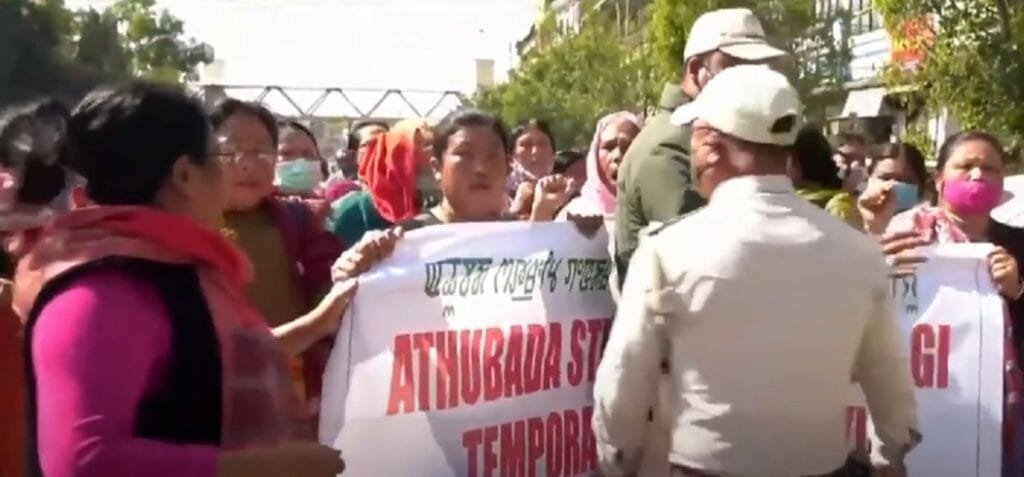 Imphal street vendors’ rally demanding vending space 3 Police stopping a rally of street vendors midway in Imphal on Tuesday