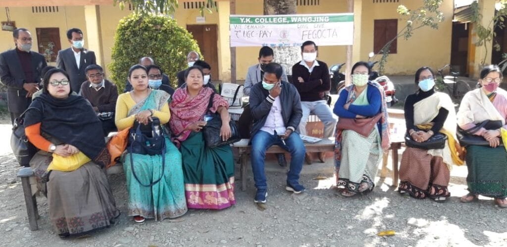 Teachers of YK College Thoubal staging sit in protest demanding 7th UGC Pay and Regulation 2018 on Wednesday