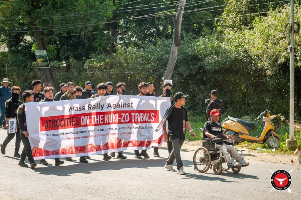 Mass rally held in Churachandpur against atrocities on Kuki-Zo tribals 1 A person on a wheelchair leading the ITLF rally in Churachandpur